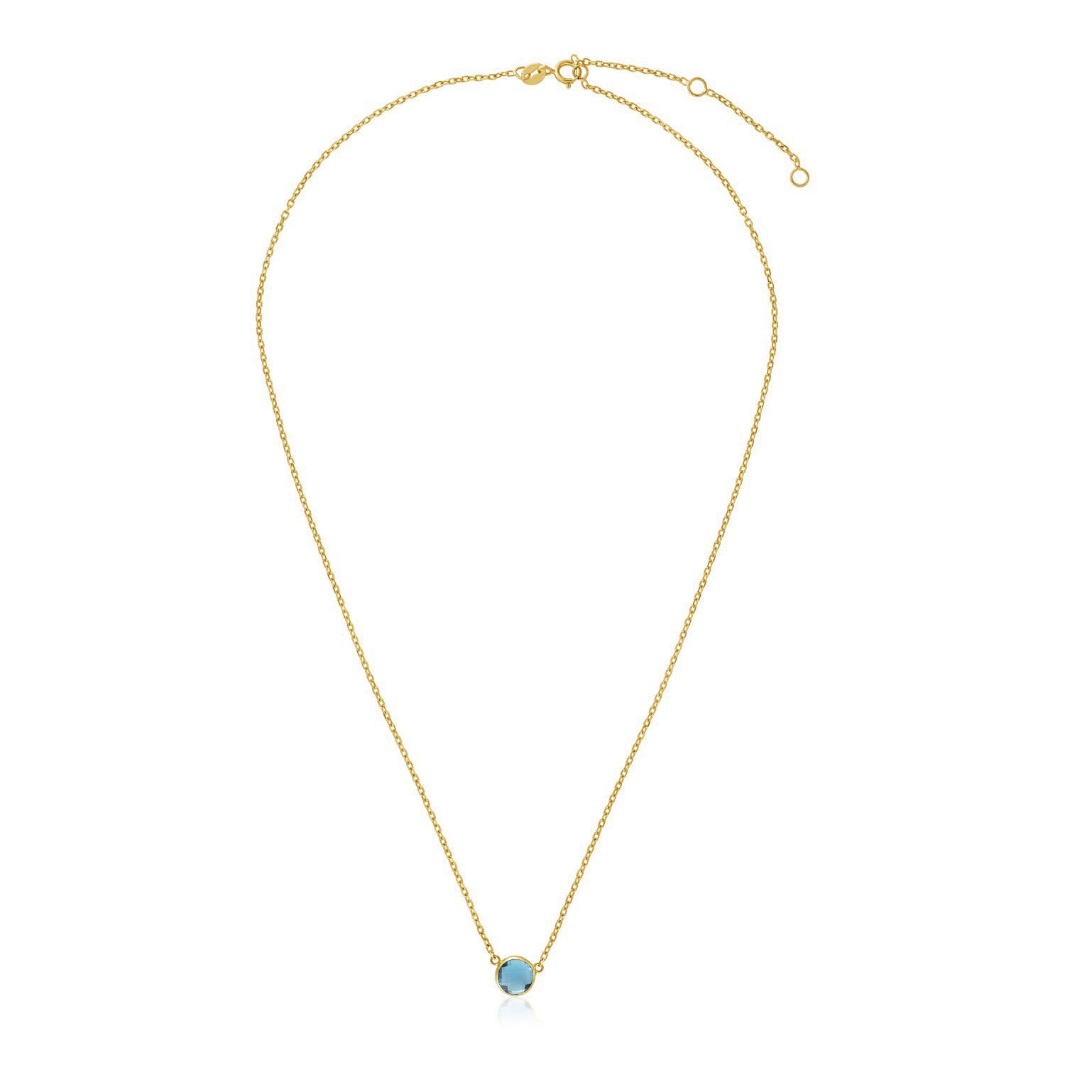 14k Yellow Gold 17 inch Necklace with Round Blue Topaz in a sleek high-contrast midnight luxury editorial style